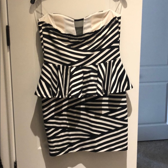 Strap less peplum black and white mini dress - Picture 2 of 2